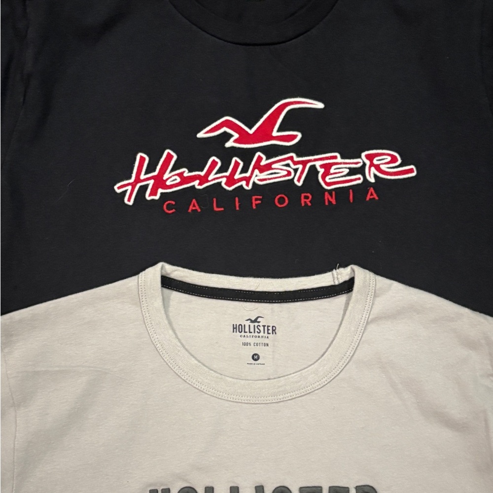 2 Hollister shirts. Black and Light Gray Tees